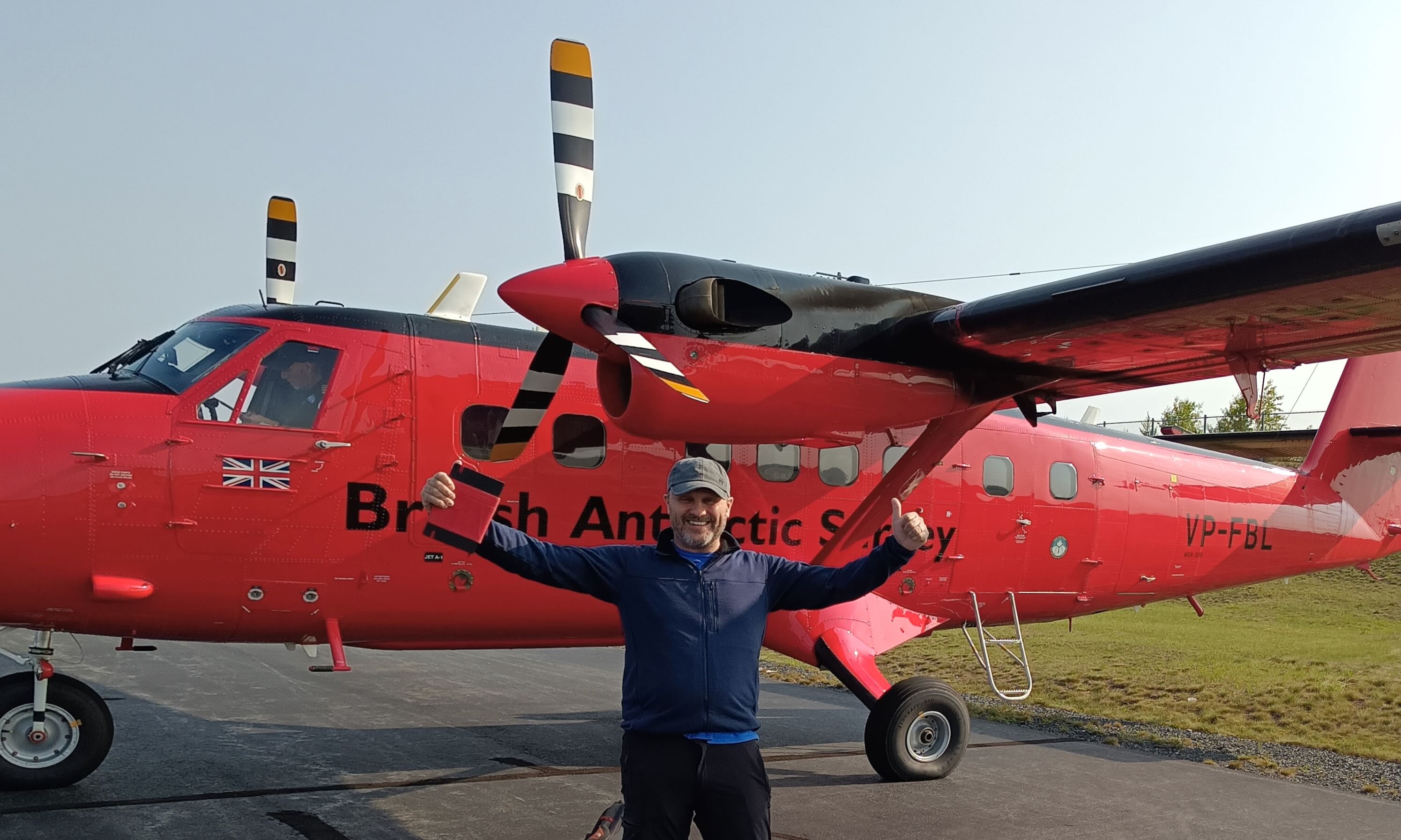 FRM4Fire Technical leader Bernardo Mota in front of British Antarctic Survey de Havilland Twin Otter during the September 2024 CarbonARA campaign in Fort McMurray, Alberta, Canada 